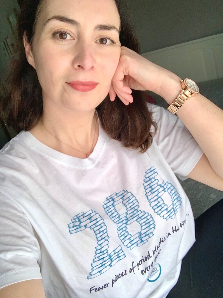 Becky wearing a Lil-lets campaign t shirt printed with 286 fewer pieces of period plastic in the world.